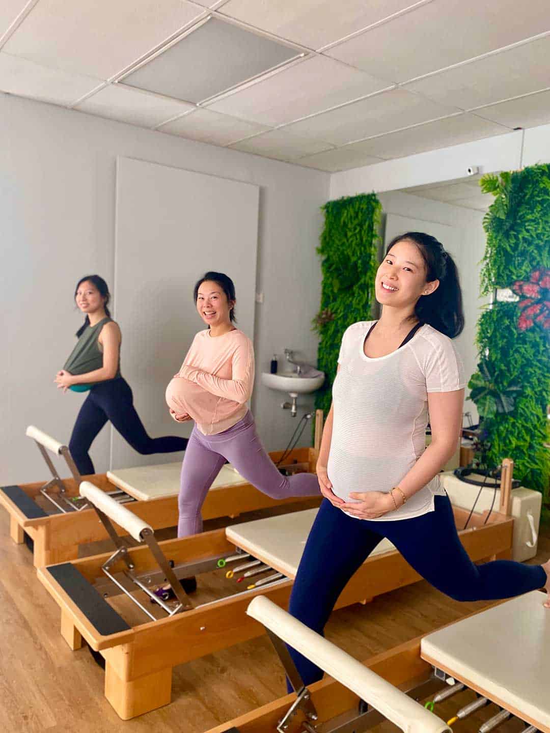 A client does pre-natal pilates with the instructors.