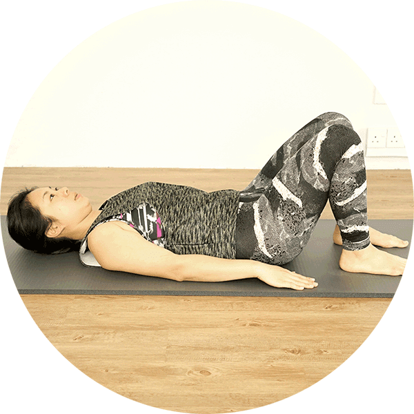 Shoulder Bridge Starting Position. Lie on your back with your knees bent and your arms by your sides.